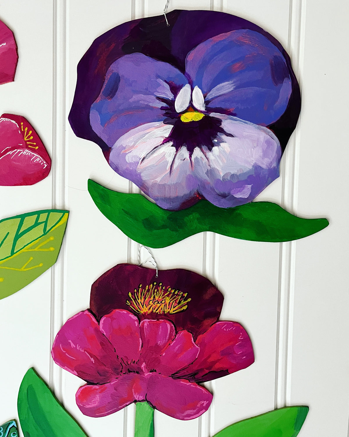 cutout wooden flower painting, by artist Abigail Gray Swartz. Purple pansy flower in group, acrylic on panel.