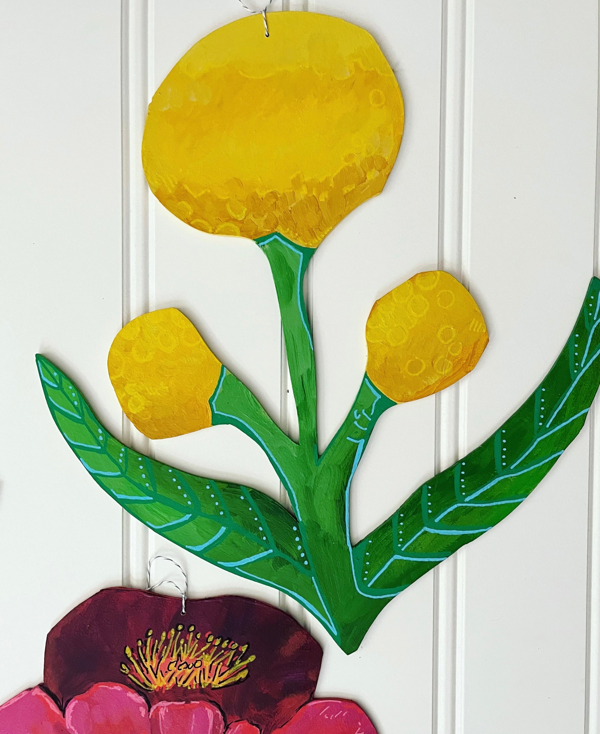 cutout wooden flower painting, by artist Abigail Gray Swartz. three yellow flowers, acrylic on panel.