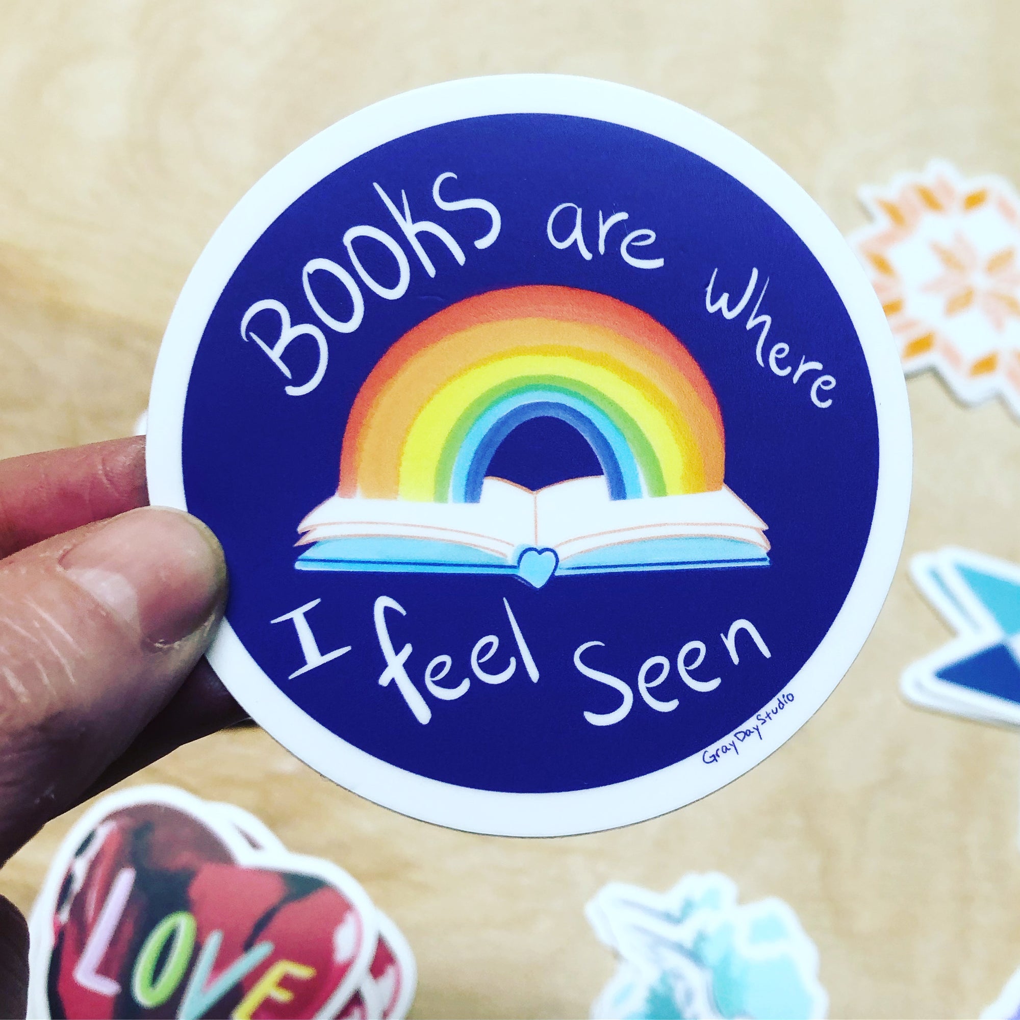 Books are where I feel see-Sticker. Rainbow pride book lover sticker.