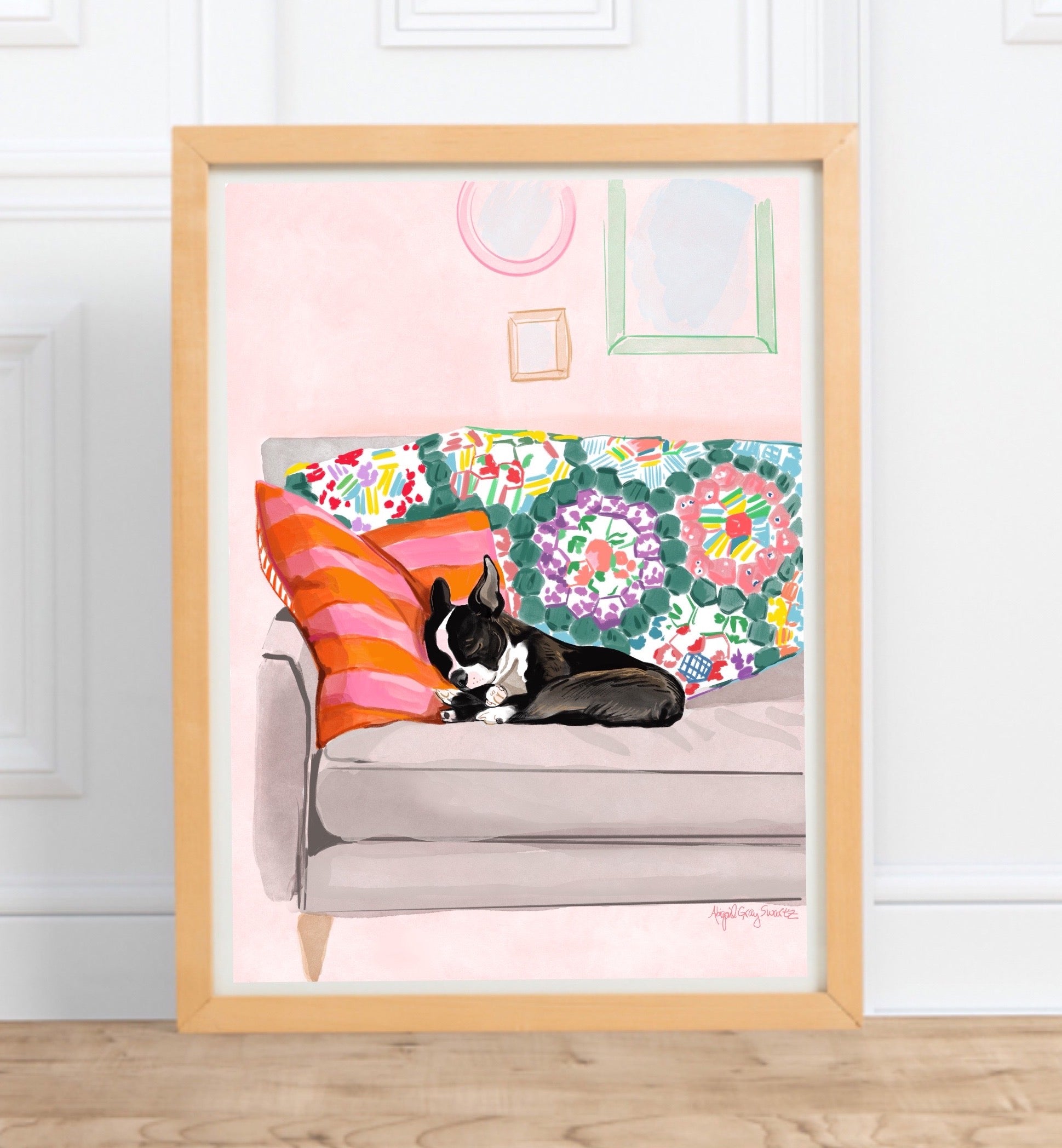 Puppy naps print, boston terrier napping on a sofa in a pink living room with colorful quilt and textiles. Artwork made in Maine by Abigail Gray Swartz