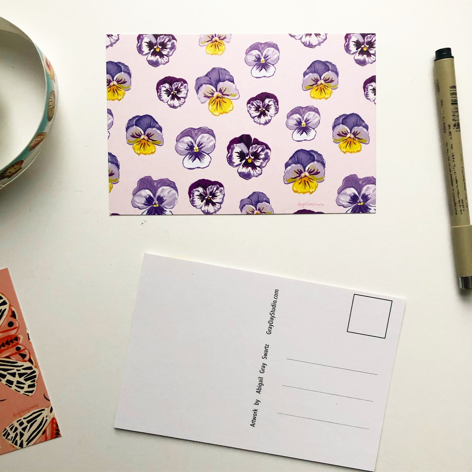 Pansies postcard with a light pink background. BY GrayDayStudio. Buy a set and save.