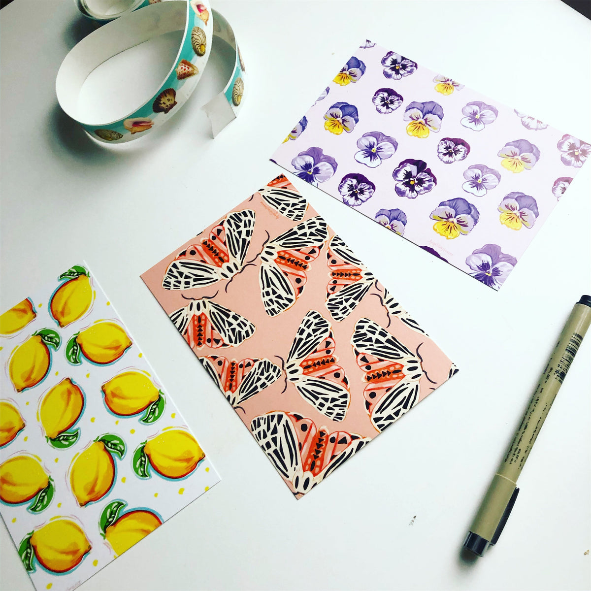 Set of three postcards by GrayDayStudio- lemon, moth, pansies.